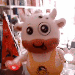 Muñeco vaca bailarina con luces
